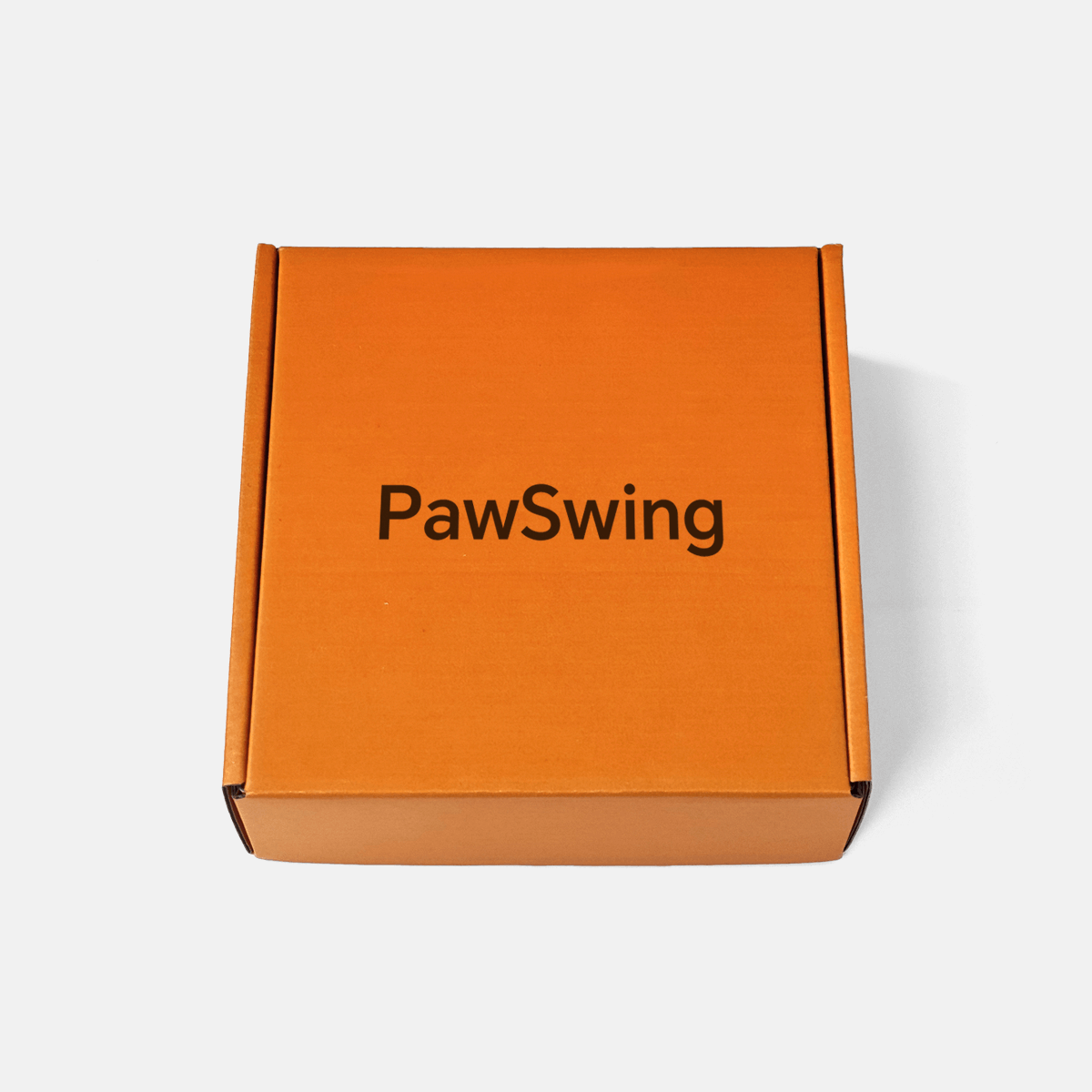 Außenseite der orangefarbenen Markenbox für den Versand der PawSwing® Katzenbox-Matte