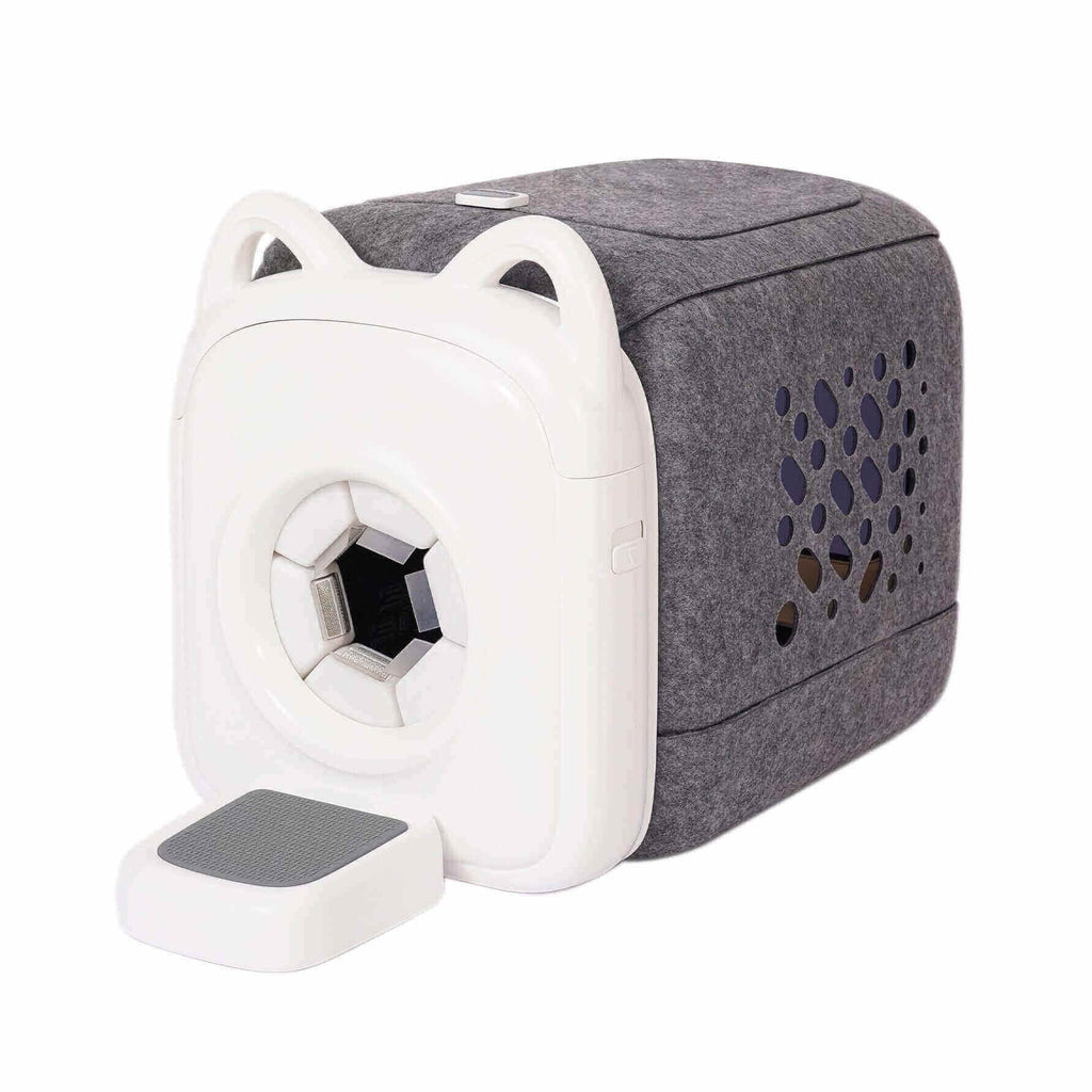 Graues PawSwing AutoComb Pro Pflegegerät mit Katzenohren-Design, perfekt für automatische Haustierpflege.